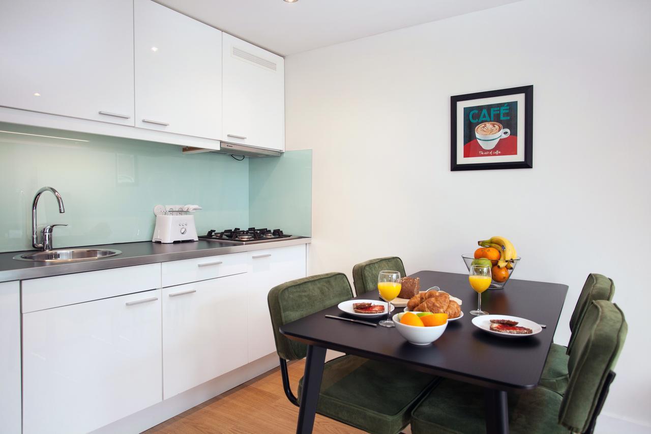 Stayci Serviced Apartments Central Station L'Aia Esterno foto