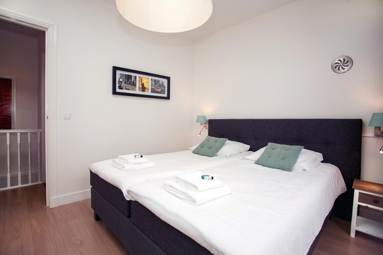 Stayci Serviced Apartments Central Station L'Aia Esterno foto