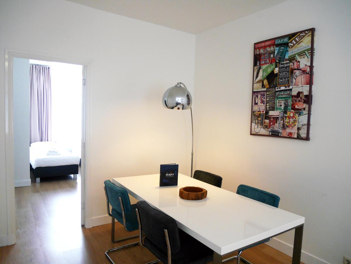 Stayci Serviced Apartments Central Station L'Aia Esterno foto