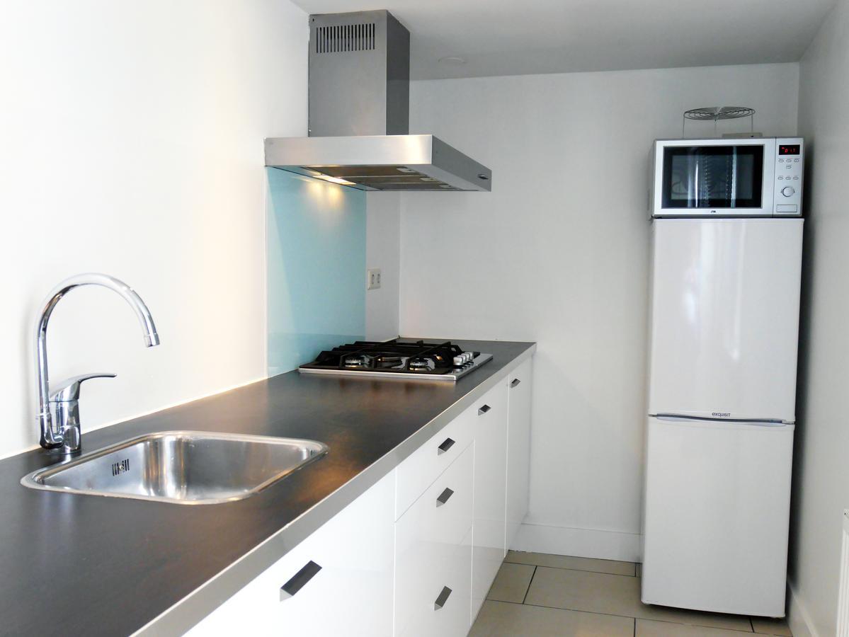 Stayci Serviced Apartments Central Station L'Aia Esterno foto