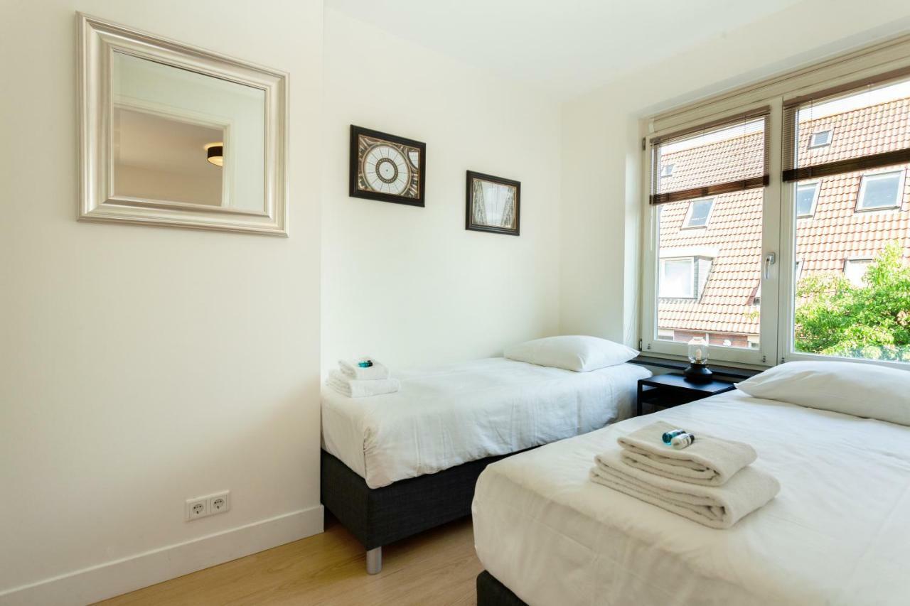 Stayci Serviced Apartments Central Station L'Aia Esterno foto