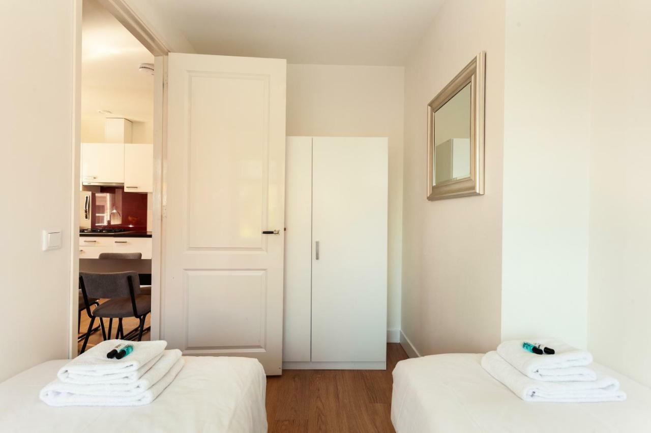 Stayci Serviced Apartments Central Station L'Aia Esterno foto