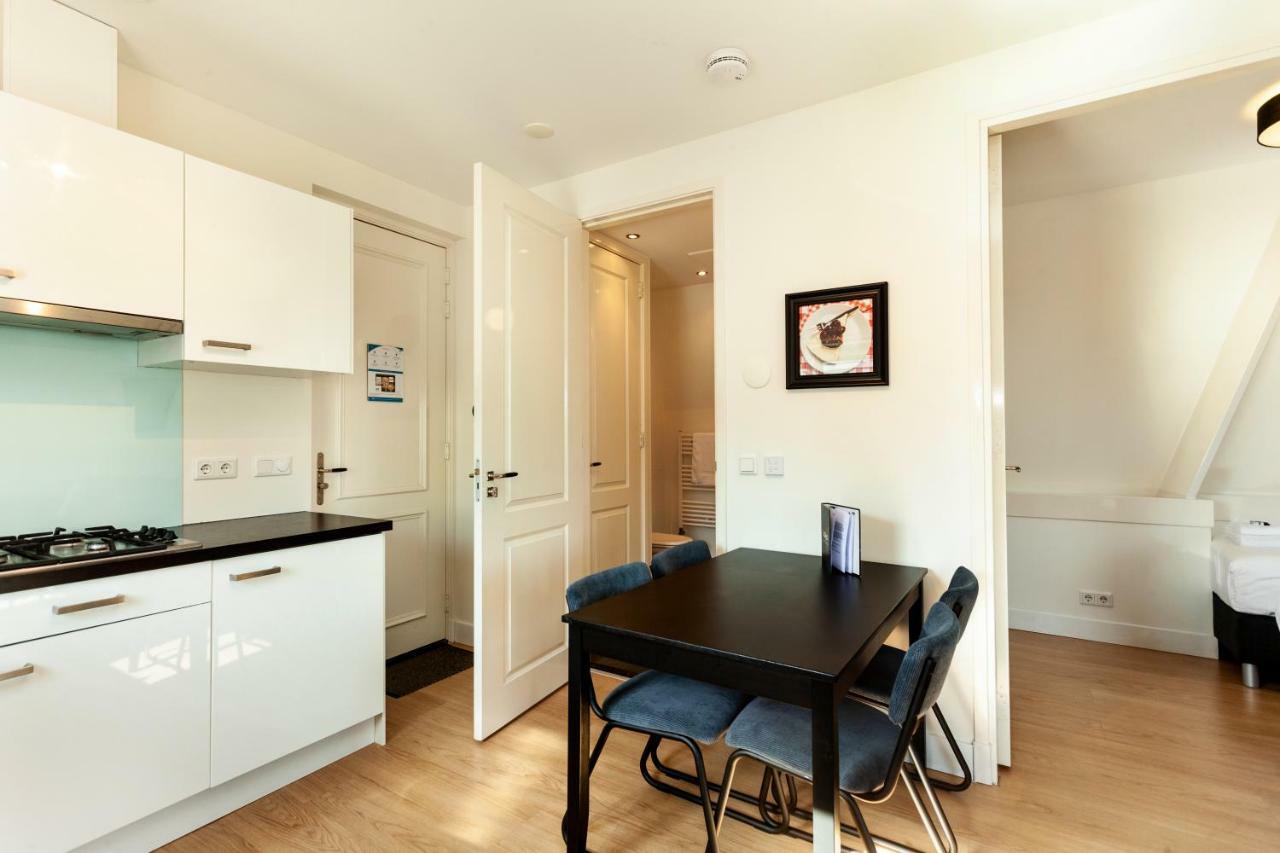 Stayci Serviced Apartments Central Station L'Aia Esterno foto